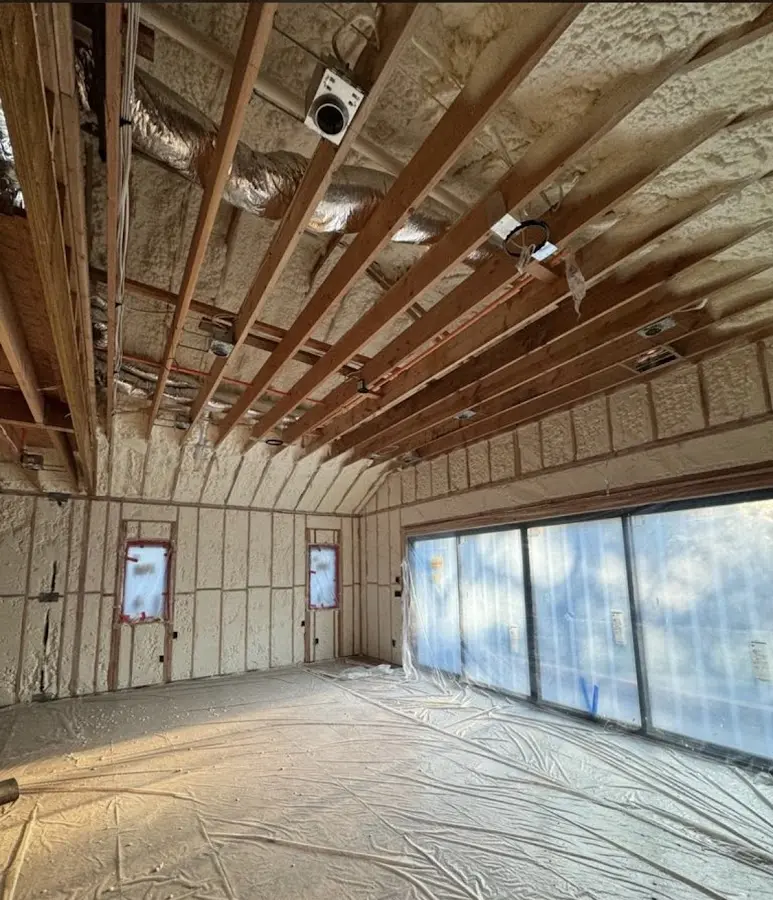 Interior walls and ceiling insulated with spray foam during new construction in Live Oak